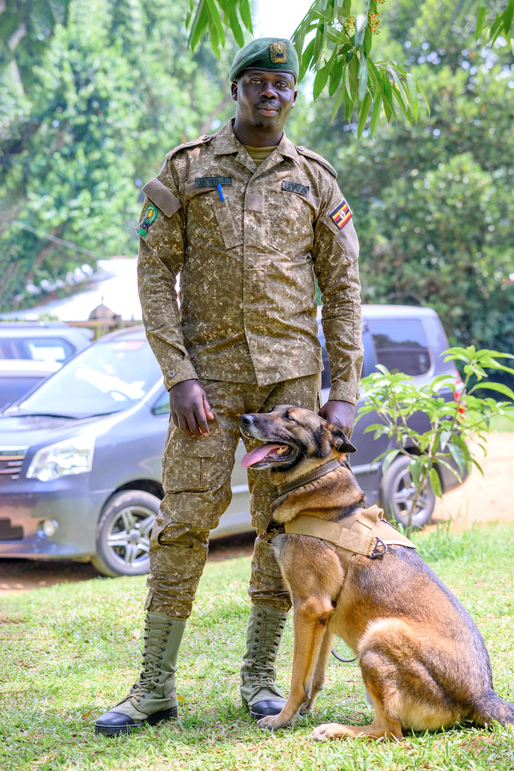 A handler and detection dog of the canine unit